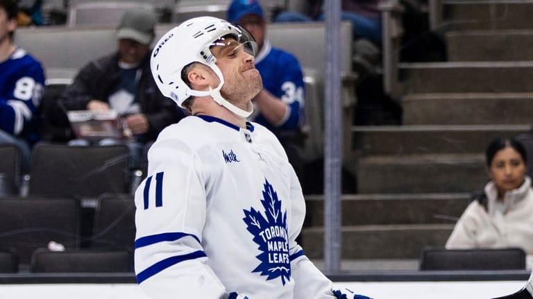 Toronto Maple Leafs center Max Domi (11) reacts after he...