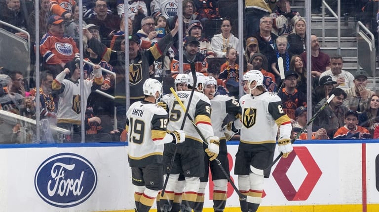 Vegas Golden Knights players celebrate a goal against the Edmonton...