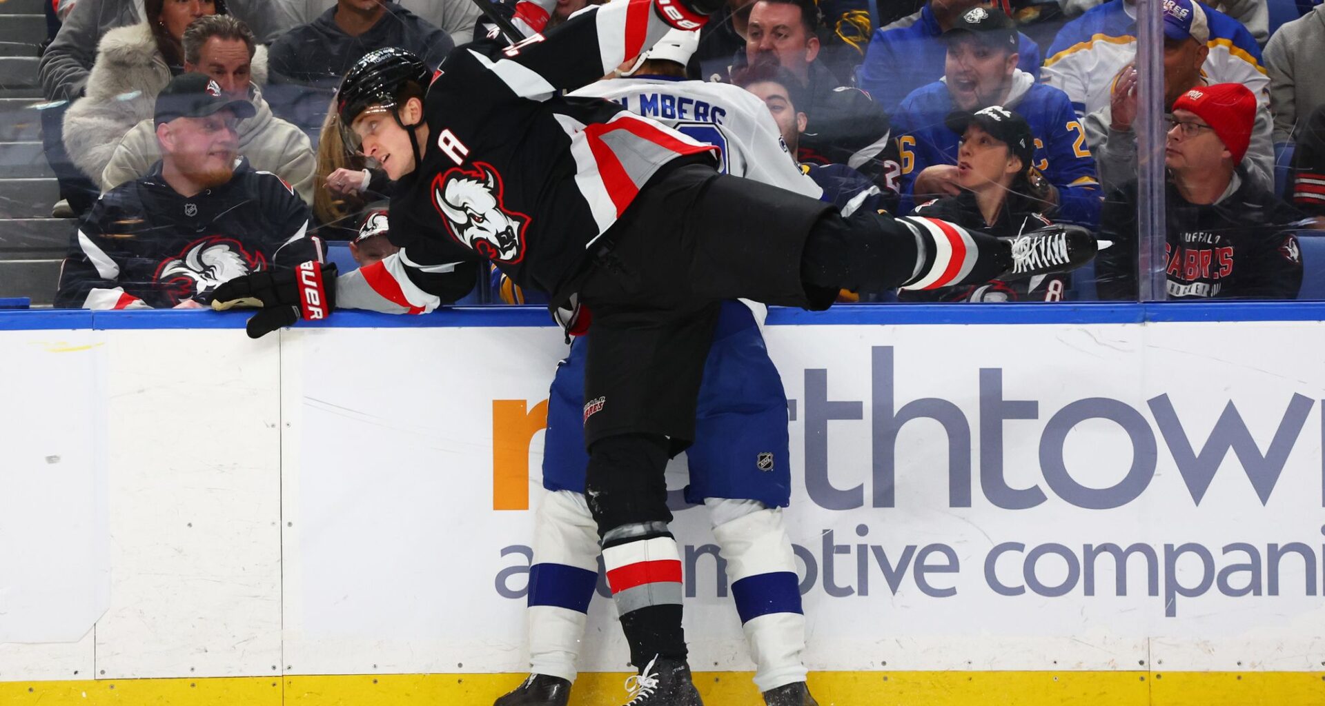 NHL investigating after Lightning forward Holmberg hurt arm crashing into unlatched penalty box door