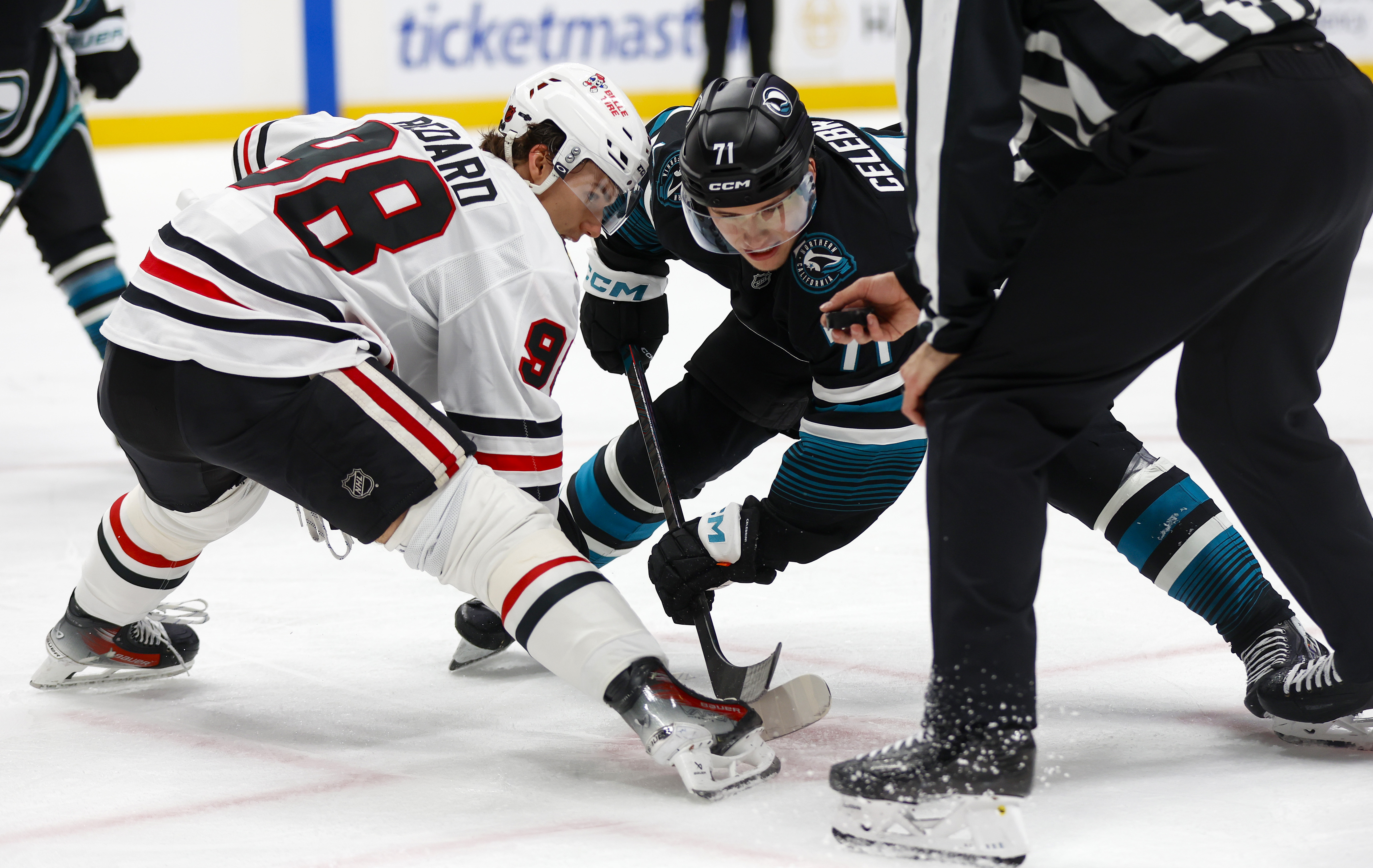 San Jose Sharks’ Macklin Celebrini (71) and Chicago Blackhawks’ Connor...