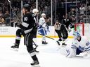 Los Angeles Kings left wing Artemi Panarin, left, celebrates after scoring on Toronto Maple Leafs goaltender Joseph Woll on Saturday in Los Angeles.