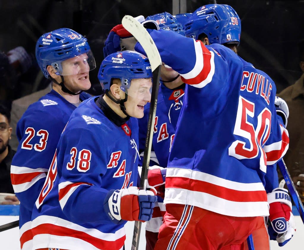 Rangers left wing Adam Sykora (C) celebrates his goal with his teammates past Florida Panthers in the third period at Madison Square Garden. New York, USA, Sunday, March 29, 2026. JASON SZENES FOR THE NEW YORK POST