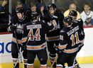 A fresh-faced Washington Capitals rookie Alex Ovechkin, centre, is congratulated by teammates after scoring one of his two goals in his first game against the Maple Leafs on Nov. 6, 2005, 
in Washington. Nick Wass/AP file