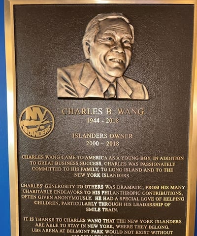 A plaque in honor of Charles Wang at UBS Arena.