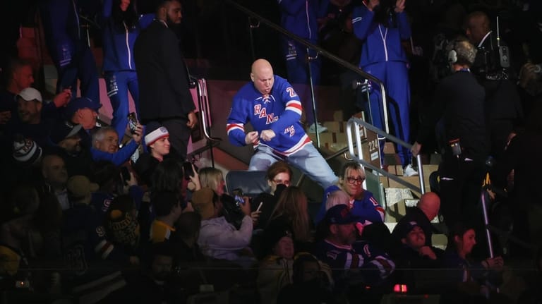 "Dancing Larry" entertains fans during the third period of a...