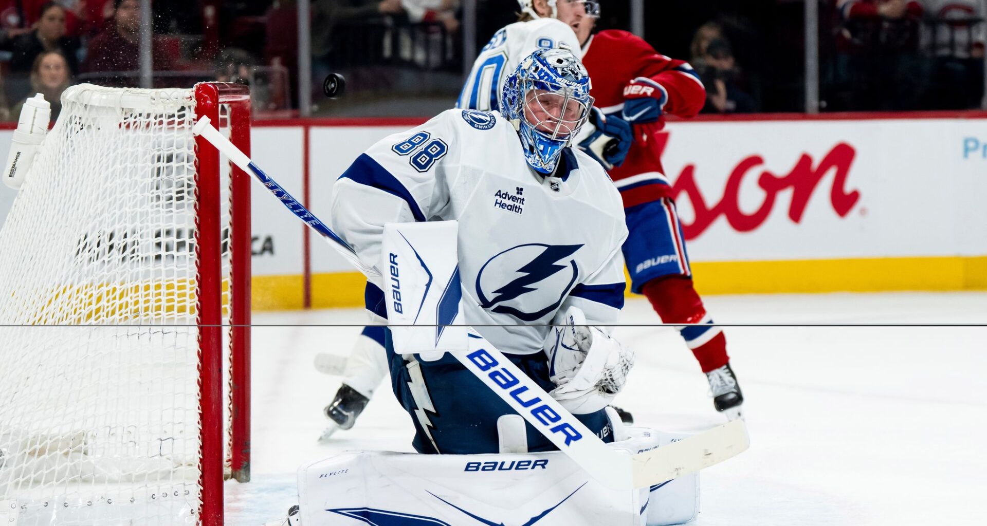 Caufield scores 50th goal, Slafkovsky nets the winner as the Canadiens beat the Lightning 2-1