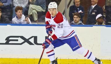 Montréal Canadiens left wing Juraj Slafkovský (20) controls the puck.