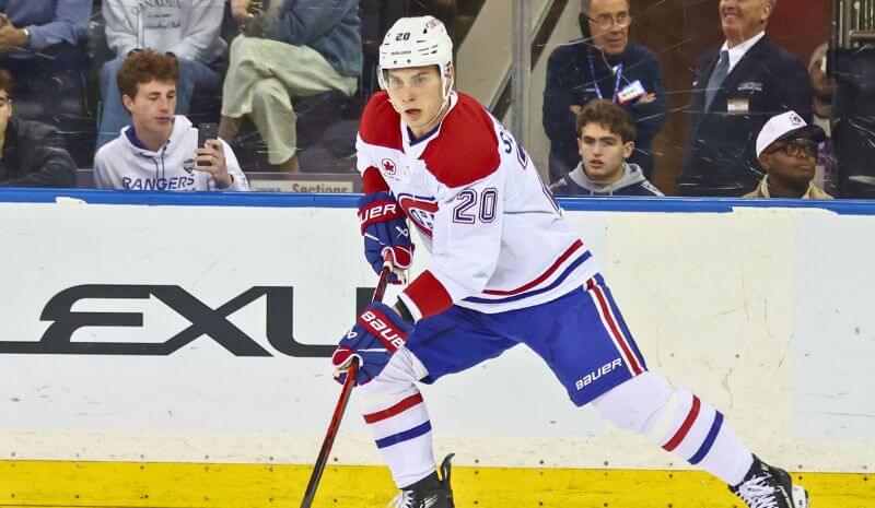 Montréal Canadiens left wing Juraj Slafkovský (20) controls the puck.