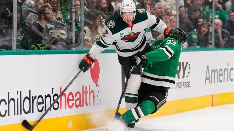 Minnesota Wild left wing Matt Boldy (12) and Dallas Stars...