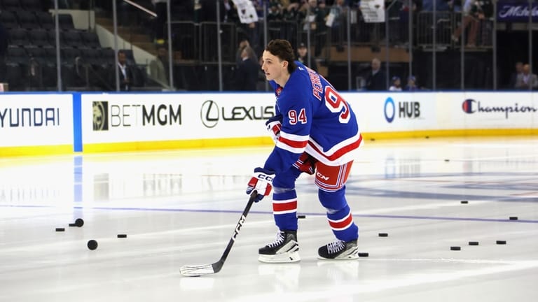Gabe Perreault of the Rangers takes his rookie lap at...