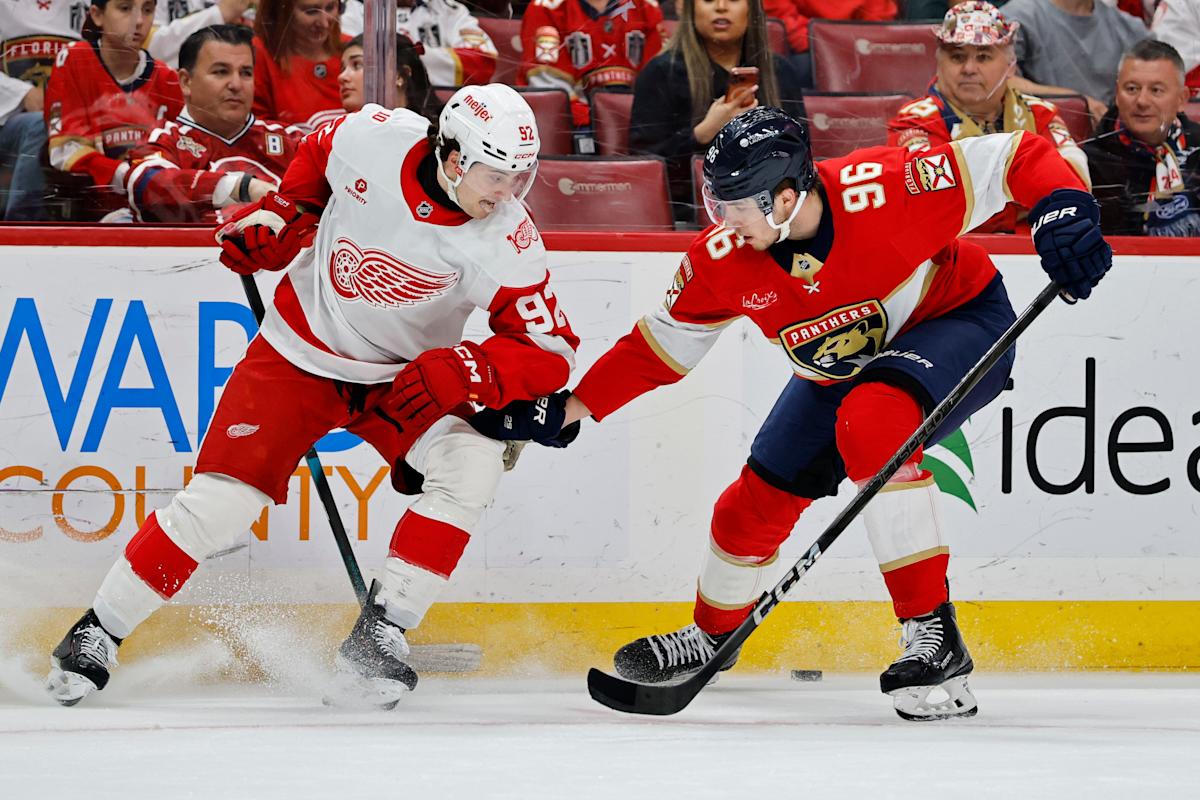 SUNRISE, FLORIDA - APRIL 15: Mikulas Hovorka #96 of the Florida Panthers battles Marco Kasper #92 of the Detroit Red Wings during the first period at Amerant Bank Arena on April 15, 2026 in Sunrise, Florida. (Photo by Carmen Mandato/Getty Images)