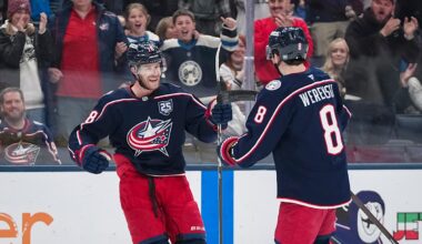 Columbus Blue Jackets defenseman Zach Werenski (8) celebrates a goal by defenseman Damon Severson (78) during the first period of the NHL hockey game against the Seattle Kraken at Nationwide Arena on March 21, 2026.