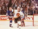 Vancouver Canucks winger Geoff Courtnall celebrates his overtime goal against the Winnipeg Jets on March 30, 1991 at the Pacific Coliseum.