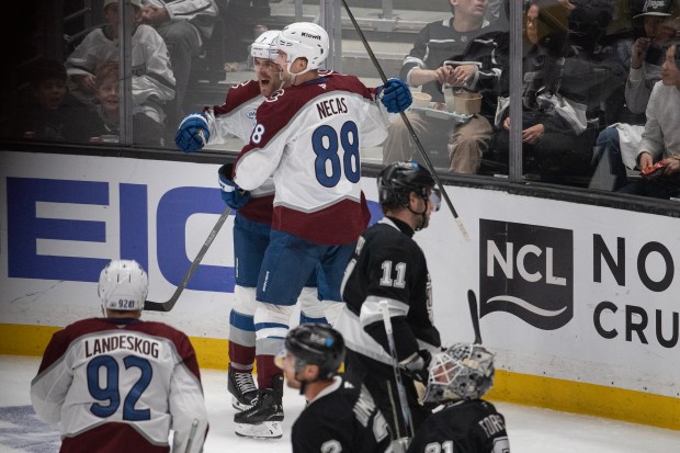 Defenseman Devon Toews (7) of the Colorado Avalanche celebrates his goal on goaltender Anton Forsberg (31) of the Los Angeles Kings with teammate center Martin Necas (88) during the third period of Game 4 of the first round of the Stanley Cup Playoffs on Sunday, April 26, 2026, at Crypto.com Arena in Los Angeles, Calif. (Photo by Timothy Hurst/The Denver Post)