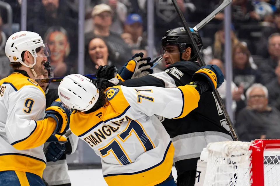 Los Angeles Kings RW Quinton Byfield (55) lands a punch on Luke Evangelista (77) during an NHL game against the Nashville Predators, Monday April 6th, 2026 in Los Angeles, California. 