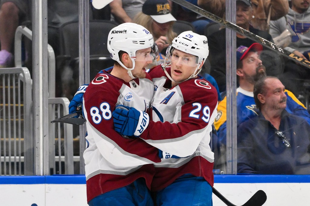 Apr 7, 2026; St. Louis, Missouri, USA; Colorado Avalanche center Martin Necas (88) celebrates with center Nathan MacKinnon (29) after scoring against the St. Louis Blues during the first period at Enterprise Center. Mandatory Credit: Jeff Curry-Imagn Images