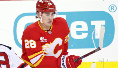 Calgary Flames defenseman Zach Whitecloud plays against the New Jersey Devils in an NHL hockey ...
