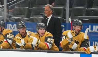 Vegas Golden Knights head coach John Tortorella, center top, looks on during the first period o ...