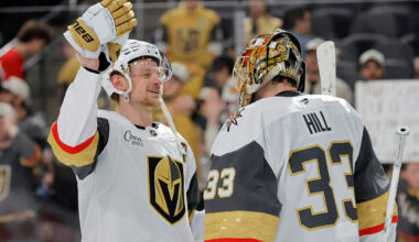 Vegas Golden Knights center Jack Eichel (9) celebrates with goaltender Adin Hill (33) after the ...