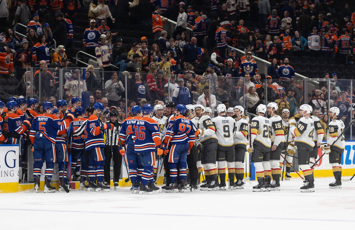 Vegas Golden Knights and Edmonton Oilers players exchange words as the leave the ice during an ...