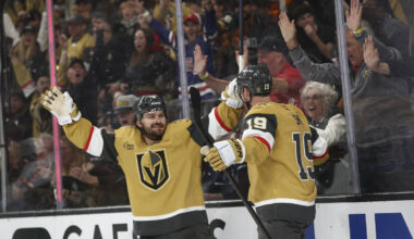 Golden Knights right wing Reilly Smith (19) celebrates his goal with defenseman Rasmus Andersso ...