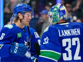 Brock Boeser, the 2023 Vancouver Masterton nominee, congratulates Kevin Lankinen after defeating the Columbus Blue Jackets at Rogers Arena on November 8, 2025.