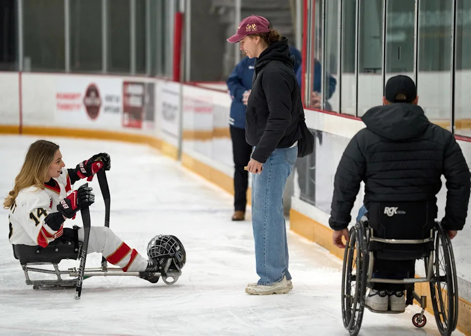 Canada’s Raphaelle Tousignant is recognized as the Canadian player of the game with Ottawa Charge forward Emily Clark making the presentation -&nbsp;Photo @ Ellen Bond