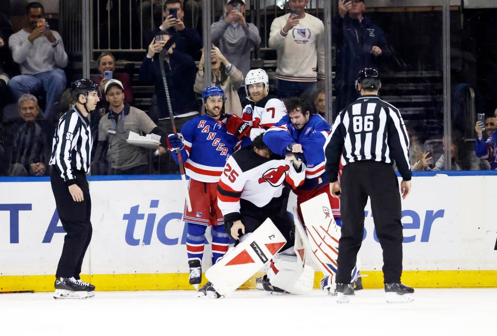 Igor Shesterkin and Jacob Markstrom fight on the ice during the first period of the Rangers’ 4-1 win over the Devils on March 31, 2026 at the Garden. Jason Szenes for the New York Post