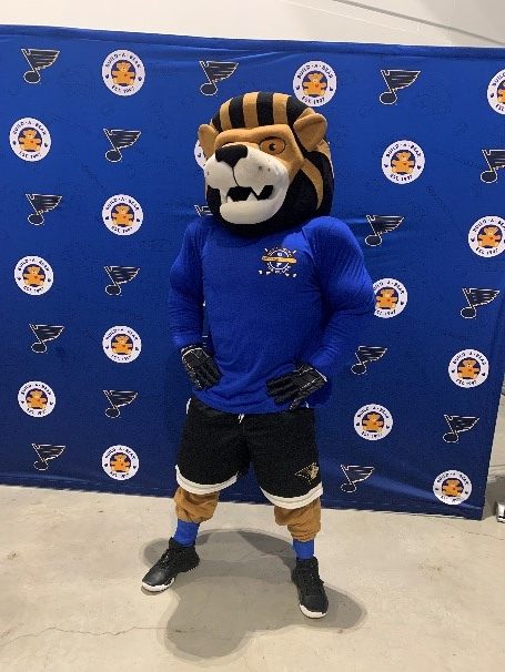 Lindenwood University’s mascot Leo poses for a photo wearing LU Night with the Blues shirt at Enterprise Center on March 15.