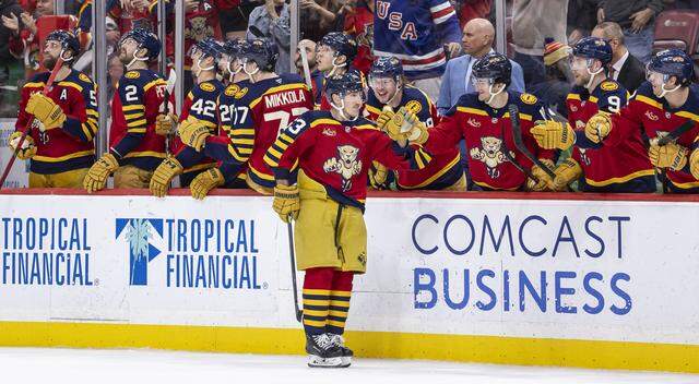 Florida Panthers left wing Brad Marchand (63) celebrates after scoring in a penalty shootout against Boston Bruins goaltender Joonas Korpisalo (70) in their NHL game at the Amerant Bank Arena on Wednesday, Feb. 4, 2026, in Sunrise, Fla.