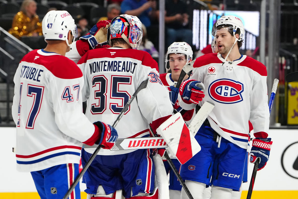 Montreal Canadiens goaltender Sam Montembeault (35) celebrates with his teammates.Stephen R&period; Sylvanie-Imagn Images