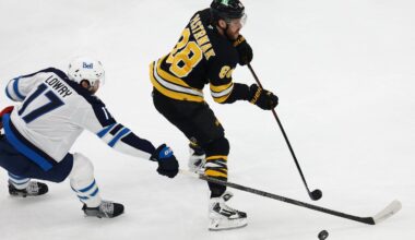 David Pastrnak (right) and the Bruins open the playoffs on the road.