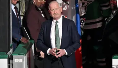 Dallas Stars general manager Jim Nill is celebrate as the Stars honor their 2026 Winter Olympics hockey players before the game against the St. Louis Blues at the American Airlines Center.