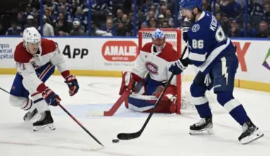 Tampa Bay Lightning right wing Nikita Kucherov (86) attempts to get past Montreal Canadian defensemen Kaiden Guhle (21) in the first period at Benchmark International Arena.