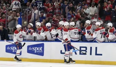 Montreal Canadian left wing Juraj Slafkovsky (20) celebrates with his teammates after scoring a goal in the first period against the Tampa Bay Lightning at Benchmark International Arena.