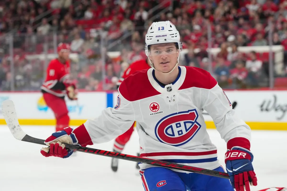 Montreal Canadiens right wing Cole Caufield (13) scores a goal against the Carolina Hurricanes during the second period at Lenovo Center.