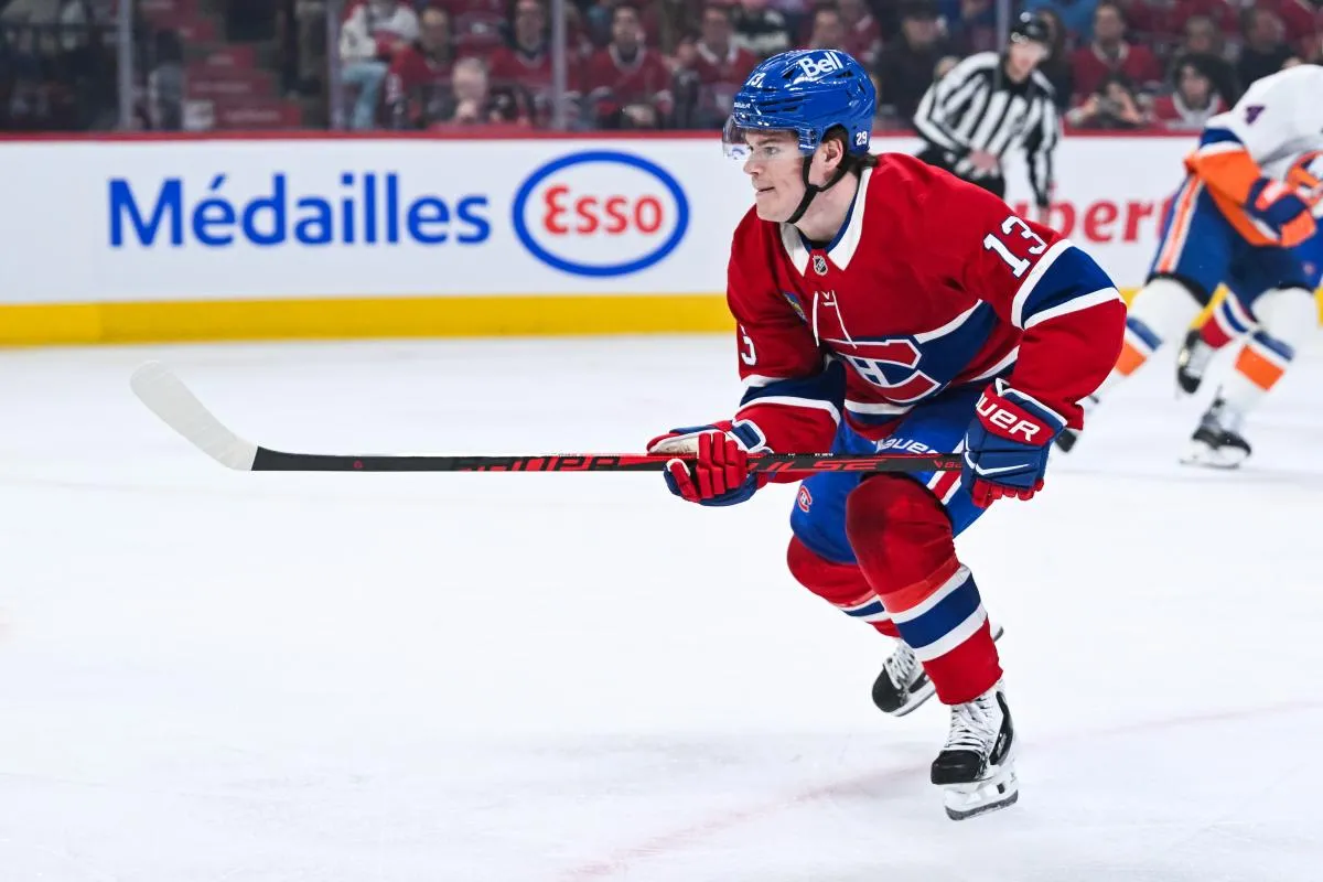 Montreal Canadiens right wing Cole Caufield (13) skates against the New York Islanders during the first period at Bell Centre.