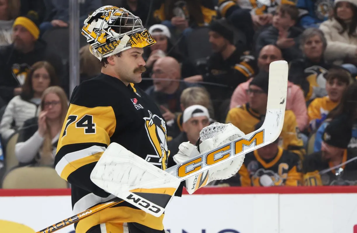 Pittsburgh Penguins goaltender Stuart Skinner (74) returns to his net against the Dallas Stars during the second period at PPG Paints Arena.