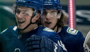 Vancouver Canucks forward Adam Gaudette (96) and forward Jake Virtanen (18) celebrate Virtanen s goal against the Toronto Maple Leafs in the second period at Rogers Arena.