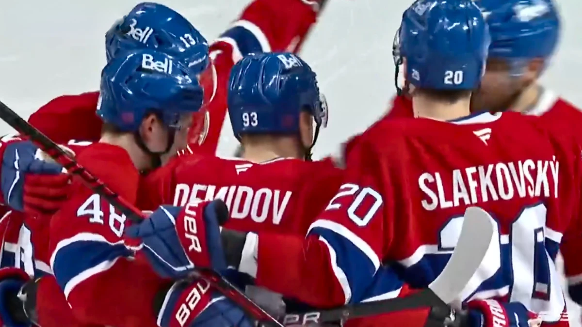 Photo of Ivan Demidov and Canadiens celebrating goal vs Panthers.