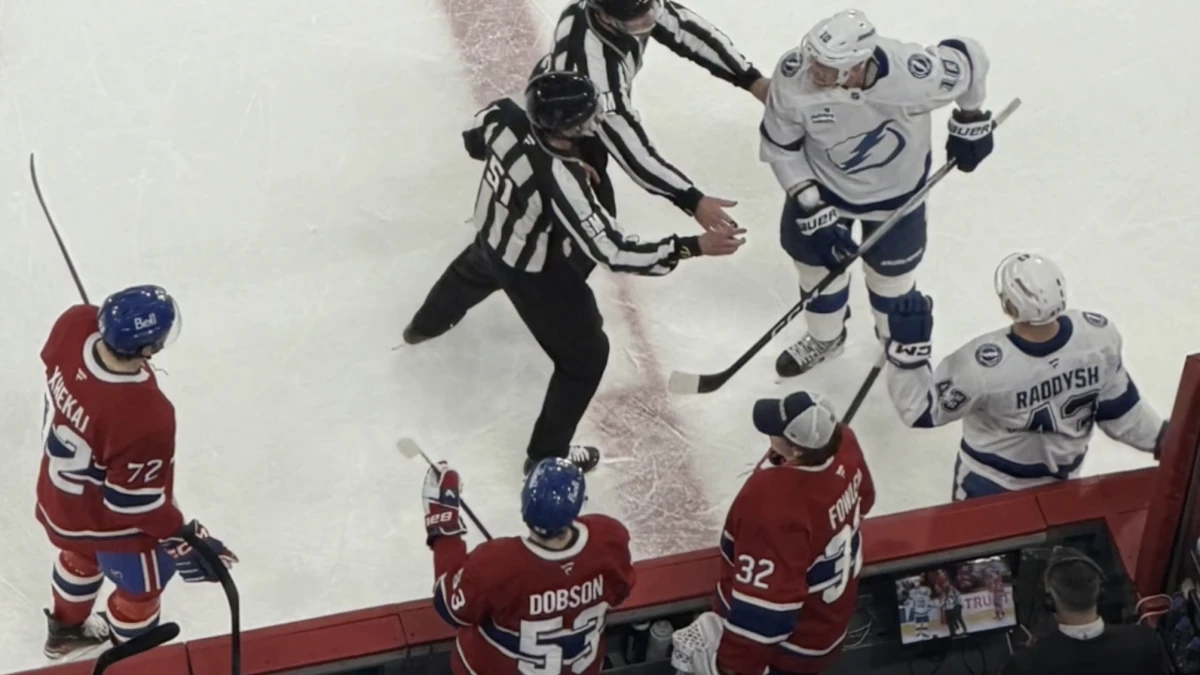 Photo of Arber Xhekaj and Corey Perry during Canadiens-Lightning game at the Bell Centre.