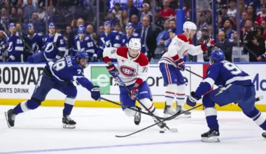 Montreal Canadiens forward Zachary Bolduc (76) skates between Tampa Bay Lightning defenseman Emil Lilleberg (78) and forward Joe Veleno (90) during the second period in game one of the first round of the 2026 Stanley Cup Playoffs at Benchmark International Arena.