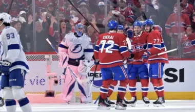 Montreal Canadiens forward Kirby Dach (77) celebrates with teammates after scoring a goal against Tampa Bay Lightning goalie Andrei Vasilevskiy (88) during the second period in game three of the first round of the 2026 Stanley Cup Playoffs at the Bell Centre.