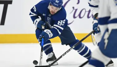 Toronto Maple Leafs forward Nick Robertson (89) gathers a loose puck in the first period against the Tampa Bay Lightning at Scotiabank Arena.