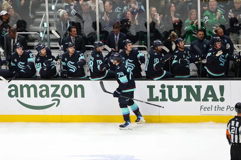 April 2nd: The Kraken Celebrate McMann's 1st Period Goal photo by Candace Kludt | The Hockey News