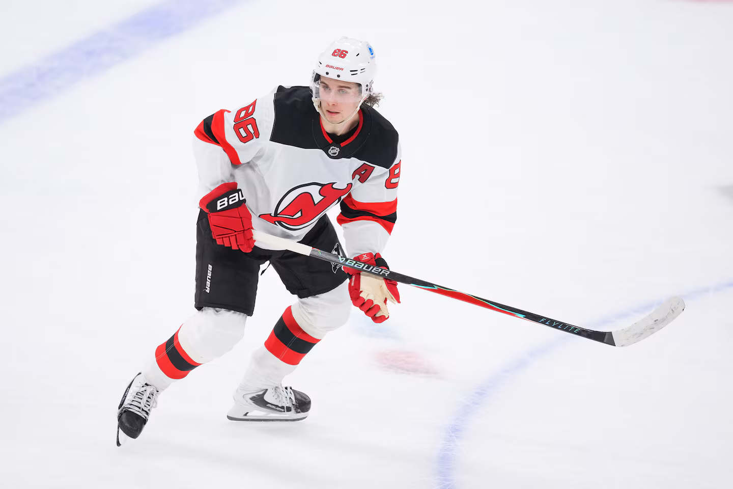 Jack Hughes' 5-point game powers the Devils to a 7-3 win over the Capitals