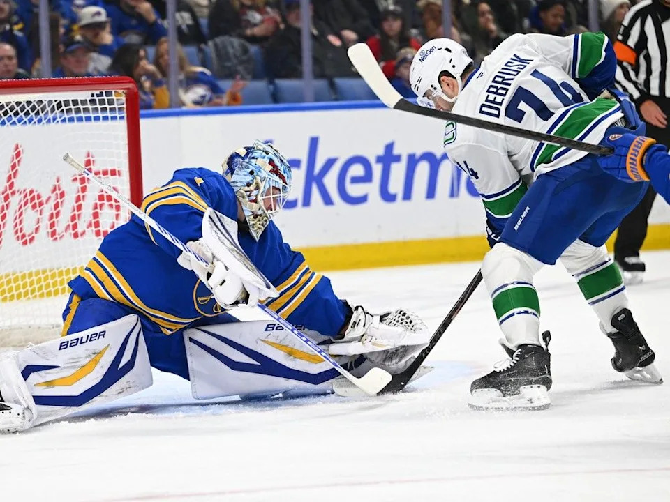  Goaltender Ukko-Pekka Luukkonen denies Jake DeBrusk during the first period of NHL game on Jan. 6 at Buffalo.