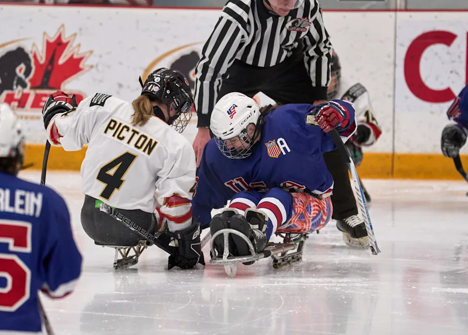 Canadian captain Christina Picton faces off against USA’s Kelsey DiClaudio -&nbsp;Photo @ Ellen Bond