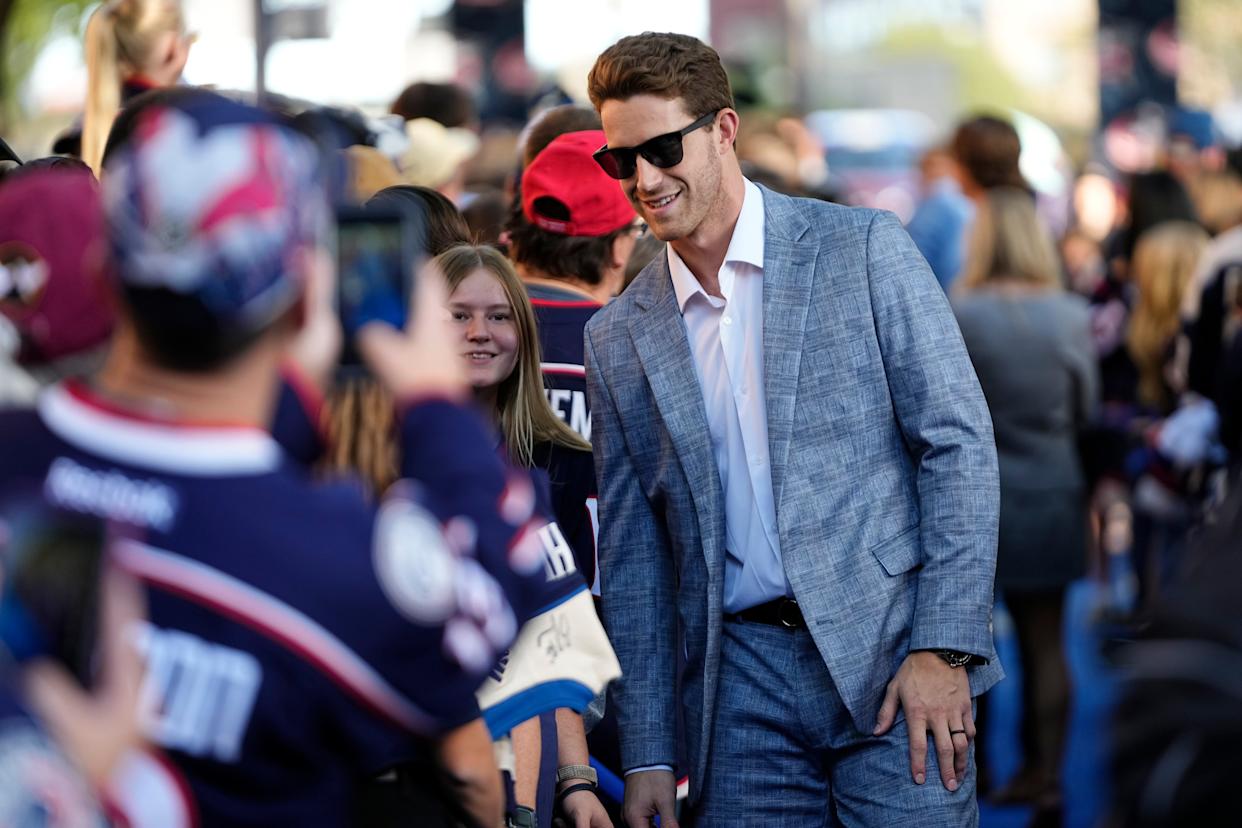 Columbus Blue Jackets defenseman Damon Severson (78) arrives on the blue carpet for the Plaza Party outside Nationwide Arena prior to the team's home opener NHL hockey game against the New Jersey Devils in Columbus on Oct. 13, 2025.