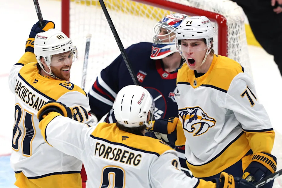 Mar 17, 2026; Winnipeg, Manitoba, CAN; Nashville Predators right wing Matthew Wood (71) celebrates a goal on Winnipeg Jets goaltender Connor Hellebuyck (37) in the third period at Canada Life Centre. Mandatory Credit: James Carey Lauder-Imagn Images